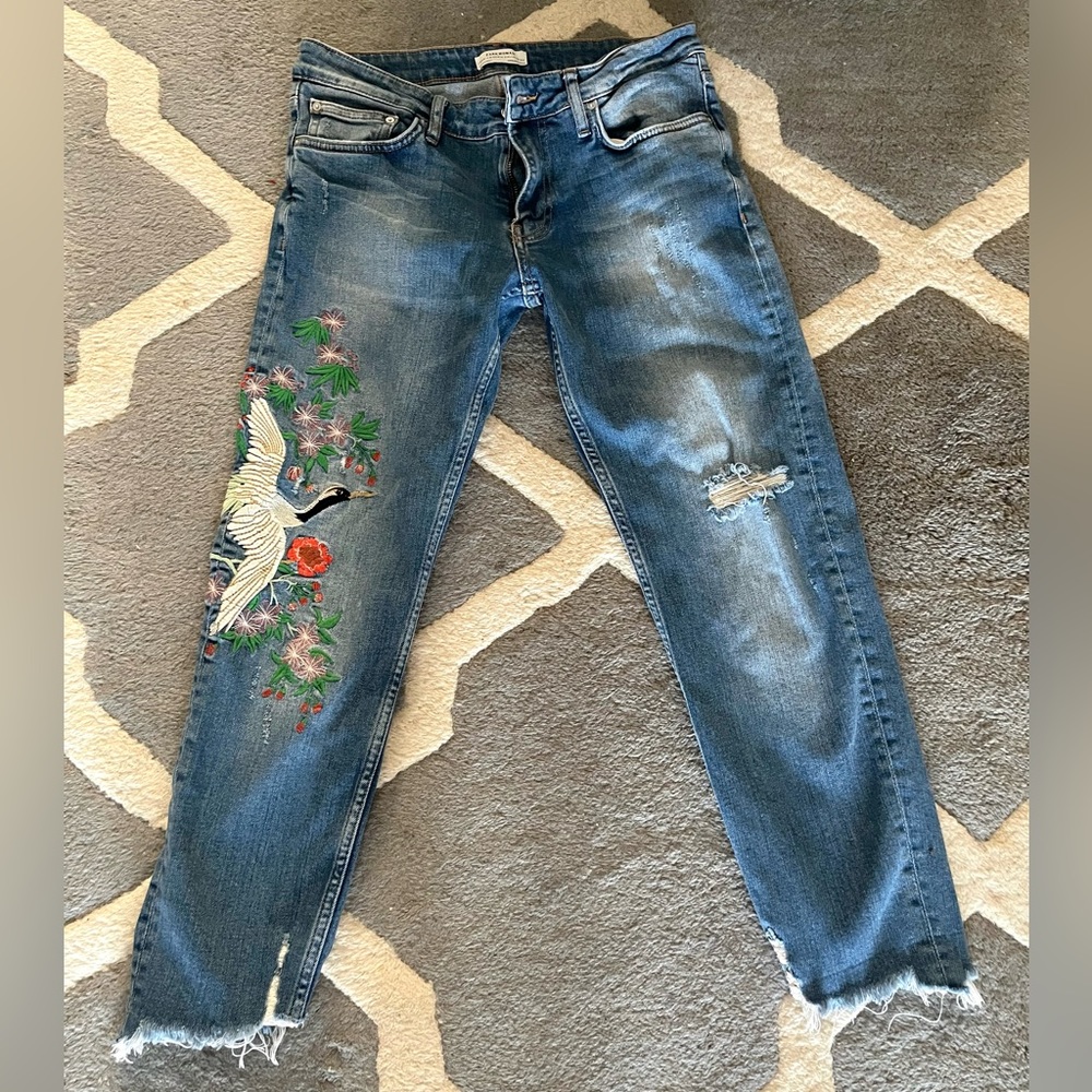 Zara jeans embroidered with crane and flowers